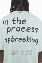 "BREAKING CURSES" TEE